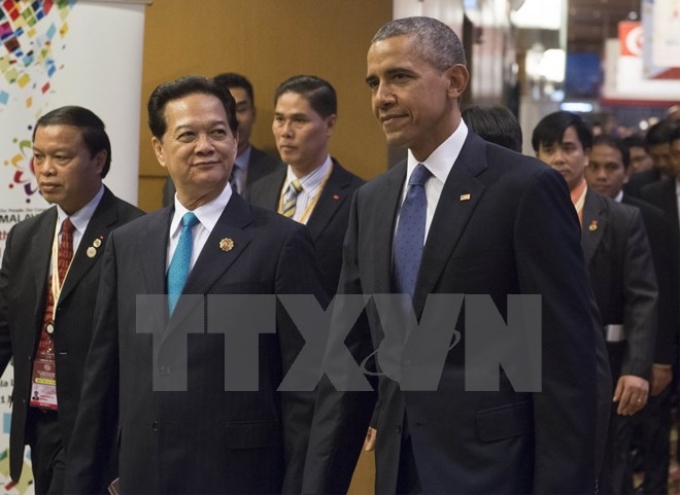 Thủ tướng Nguyễn Tấn Dũng (trái) và Tổng thống Mỹ Barack Obama (phải) tại Hội nghị Cấp cao ASEAN-Mỹ. (Nguồn: AFP/TTXVN)